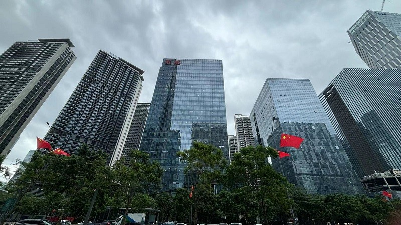 Modern buildings and trees in a company-provided photograph